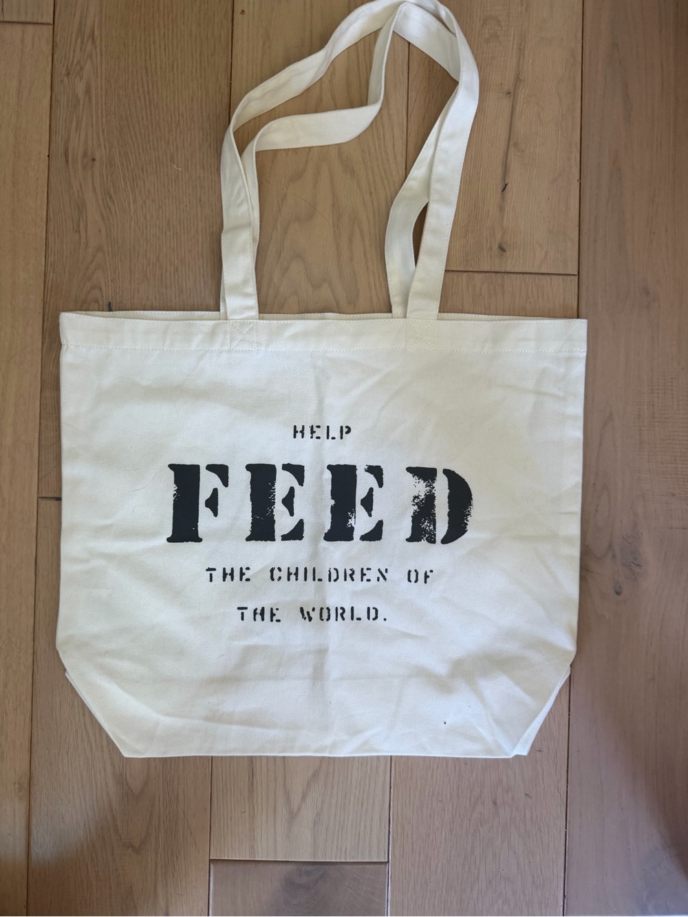 FEED Canvas Tote Bag in Cream with Black Print